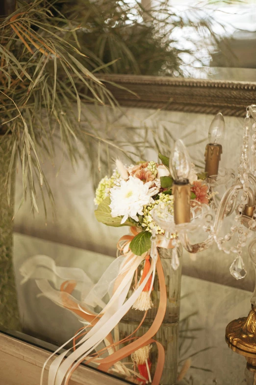 a vase filled with flowers sitting on top of a table, detail shot, sconces, flower tiara, reflecting