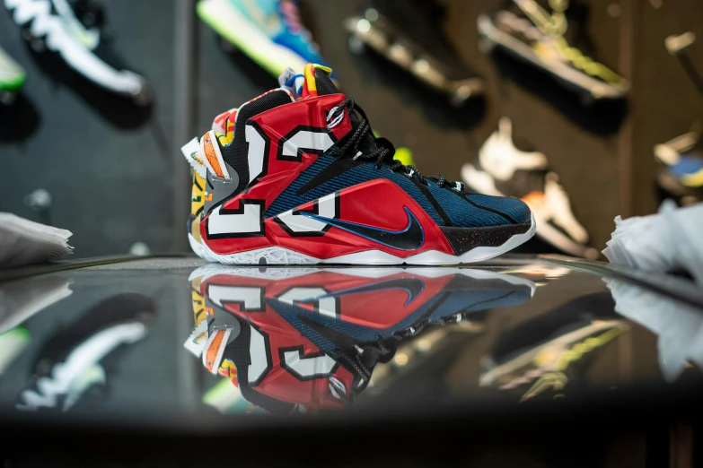 a pair of sneakers sitting on top of a glass table, toyism, lebron james, front profile shot, beak, 2263539546]