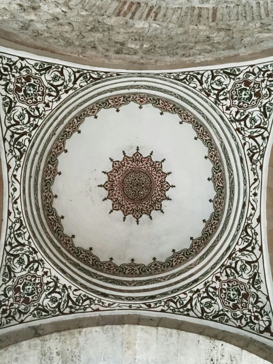 a close up of a ceiling in a building, an album cover, by Riad Beyrouti, trending on unsplash, arabesque, detailed intricate block print, 🚿🗝📝, intricate embroidery, rounded roof