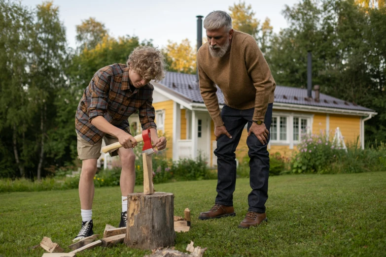 a couple of men that are standing in the grass, by Jaakko Mattila, pexels contest winner, holding wood saw, grandfatherly, teenage boy, still image from tv series