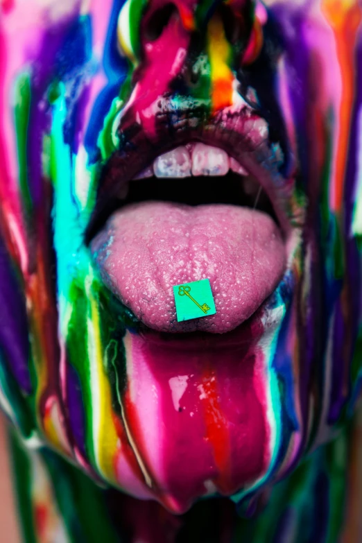 a close up of a person with colorful paint on their face, an album cover, inspired by Damien Hirst, trending on pexels, licking tongue, square masculine jaw, color ink, made of candy