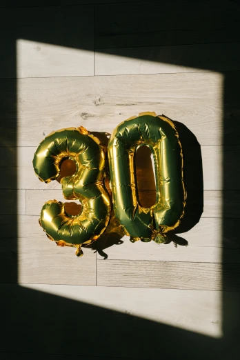 a balloon shaped like the number thirty thirty thirty thirty thirty thirty thirty thirty thirty thirty thirty thirty thirty thirty thirty thirty thirty thirty thirty thirty thirty thirty, trending on unsplash, gold and green, 30 year old man :: athletic, profile image, very old