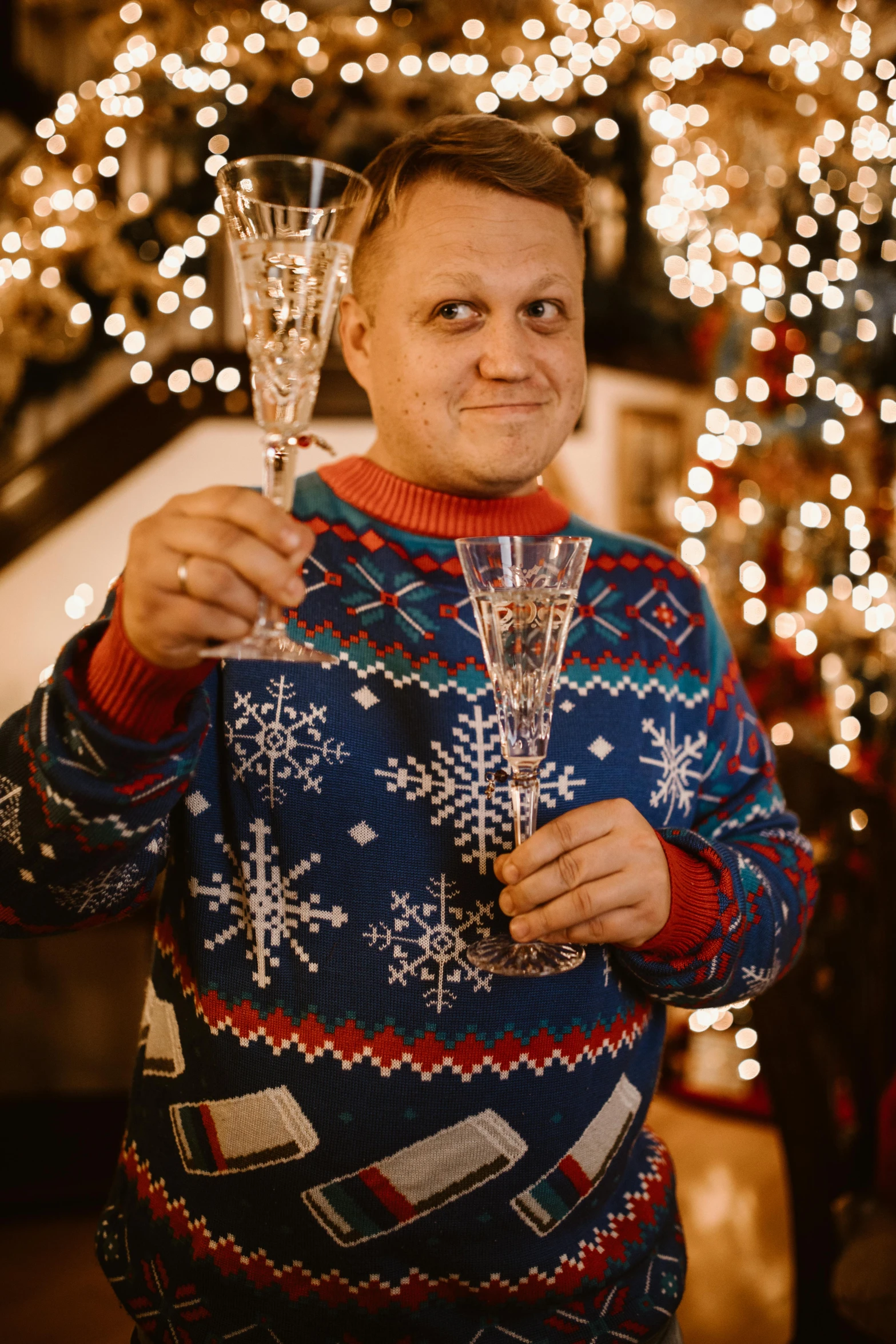 a man holding two wine glasses in front of a christmas tree, a portrait, pexels contest winner, beskinski, made out of clear plastic, gif, patterned