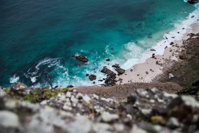 a view of the ocean from the top of a hill, pexels contest winner, turquoise water, climbing up a cliffside, ocean spray, cape