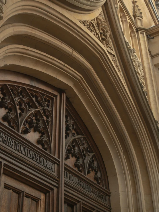 a clock that is on the side of a building, gothic arch frame, intricate detail and quality, the narthex, banner