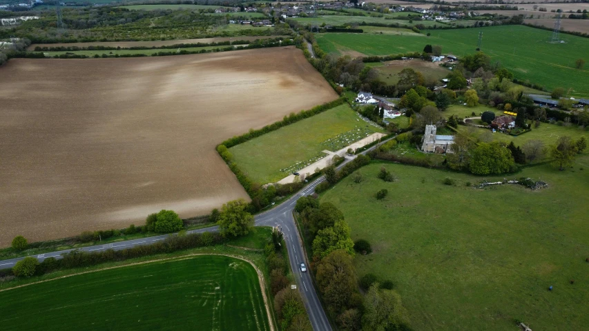 an aerial view of a farm and a road, by Julian Allen, with stone henge on top, walton ford, archeological discover, amanda lilleston