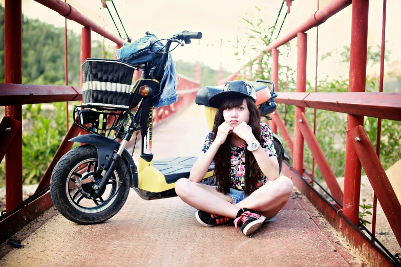 a woman sitting on a bridge next to a motorcycle, by Julia Pishtar, chinese girl, high-quality dslr photo”, anime style”, retro style ”