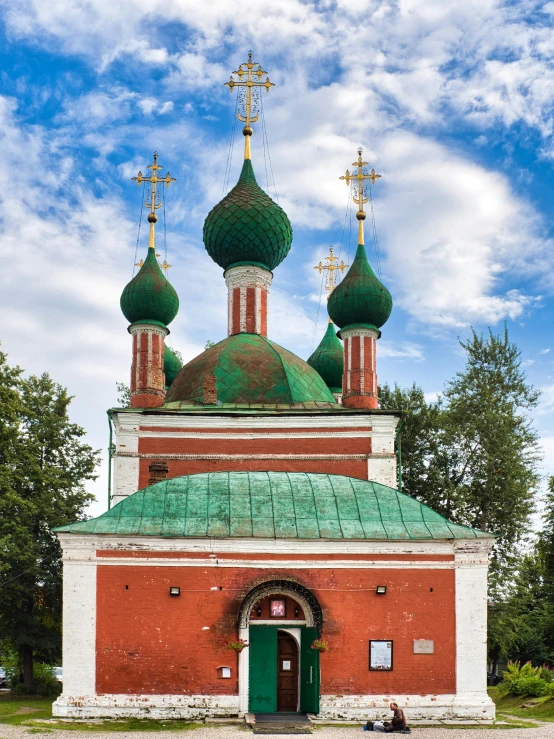 a red and white building with green domes, an album cover, inspired by Illarion Pryanishnikov, pexels contest winner, renaissance, church in the wood, exterior photo, square, фото девушка курит