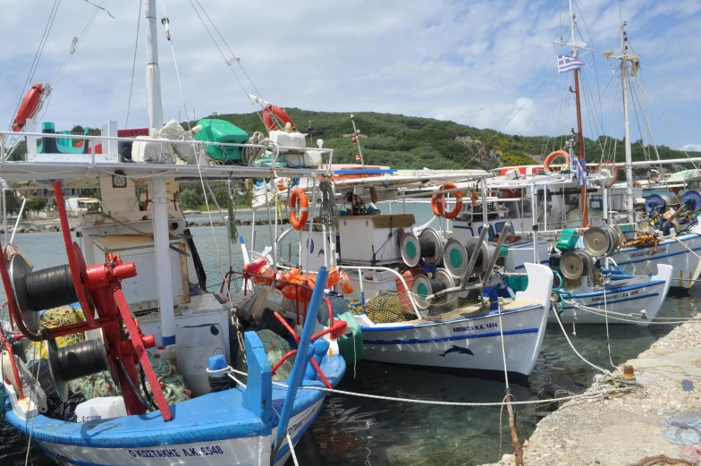 a bunch of boats that are sitting in the water, pathos, profile image, fishing village, maintenance photo