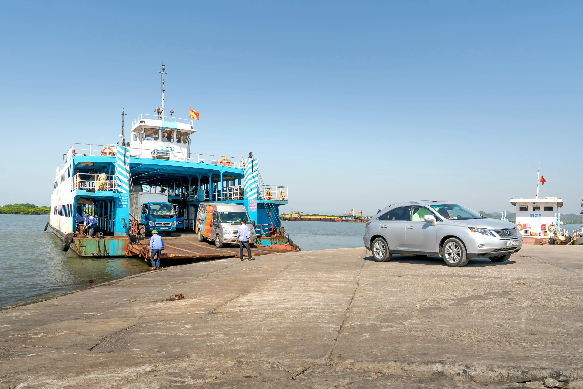 a car is parked in front of a ferry, by Dan Content, afar, avatar image, hoang lap, high resolution image