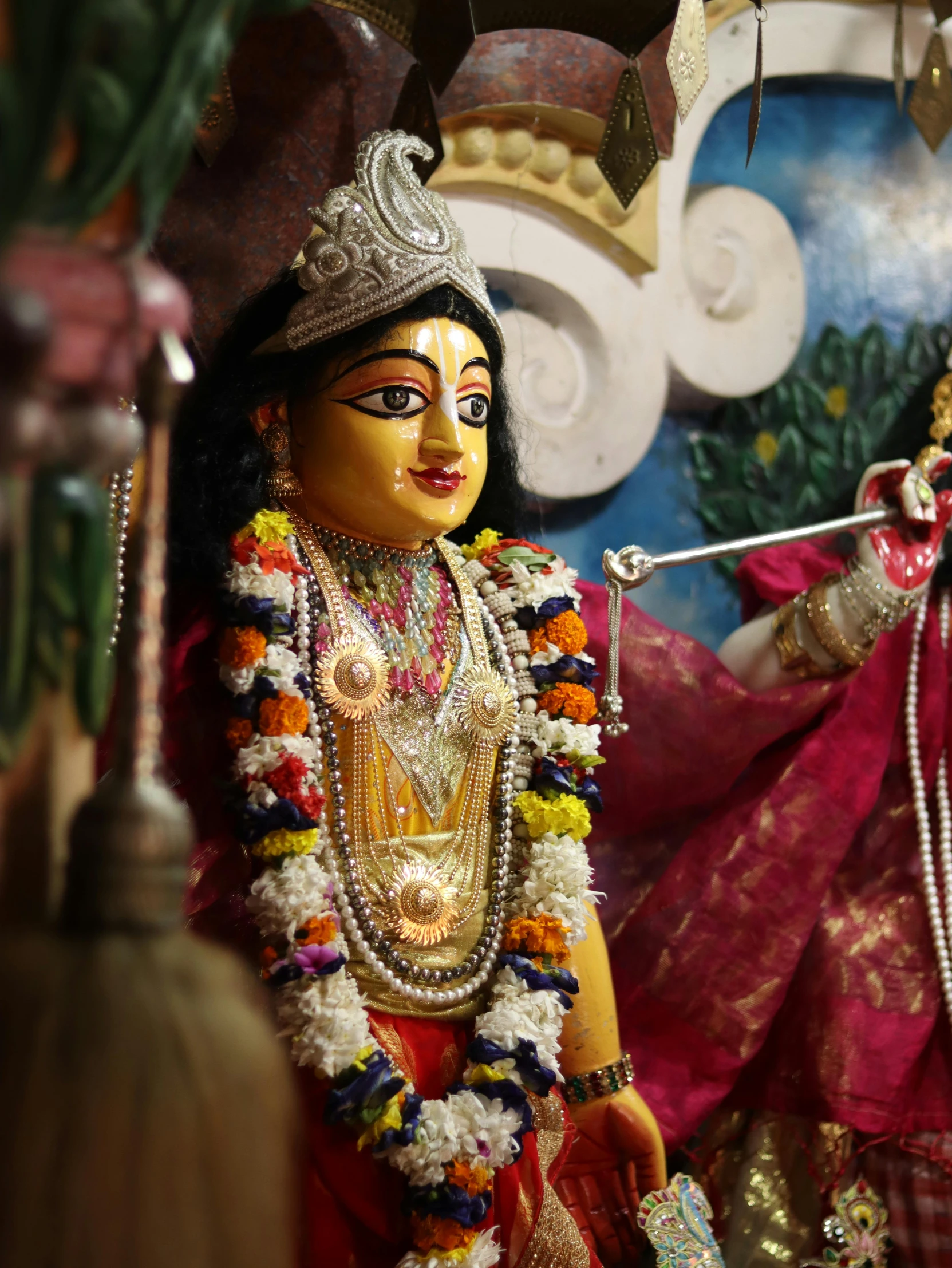 a close up of a statue of a woman, bengal school of art, standing in a hindu kovil, slide show, avatar image