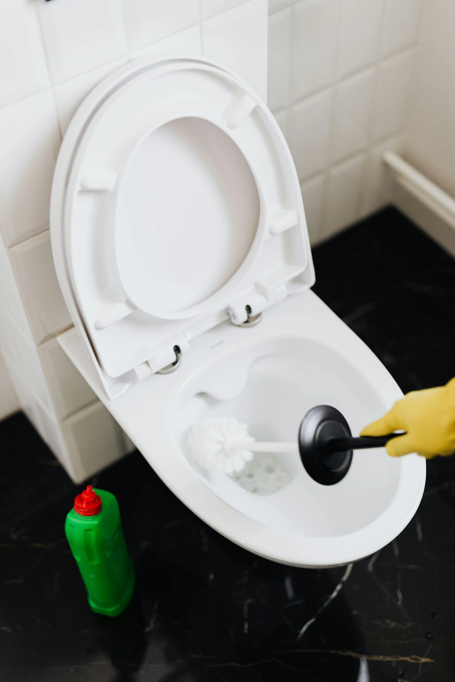 a person cleaning a toilet in a bathroom, square, thumbnail, 4l, vivid