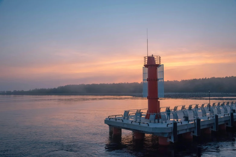 a red and white lighthouse sitting on top of a pier, by Eglon van der Neer, unsplash contest winner, the morning river, at gentle dawn blue light, espoo, joel meyerowitz