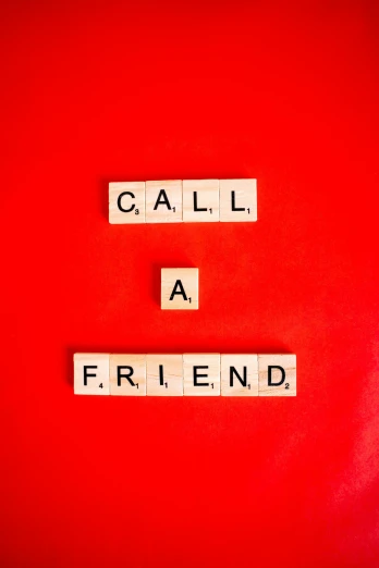 the words call a friend spelled in scrabbles on a red background, an album cover, by Carl-Henning Pedersen, shutterstock, 15081959 21121991 01012000 4k, a friend in need, square, telephone