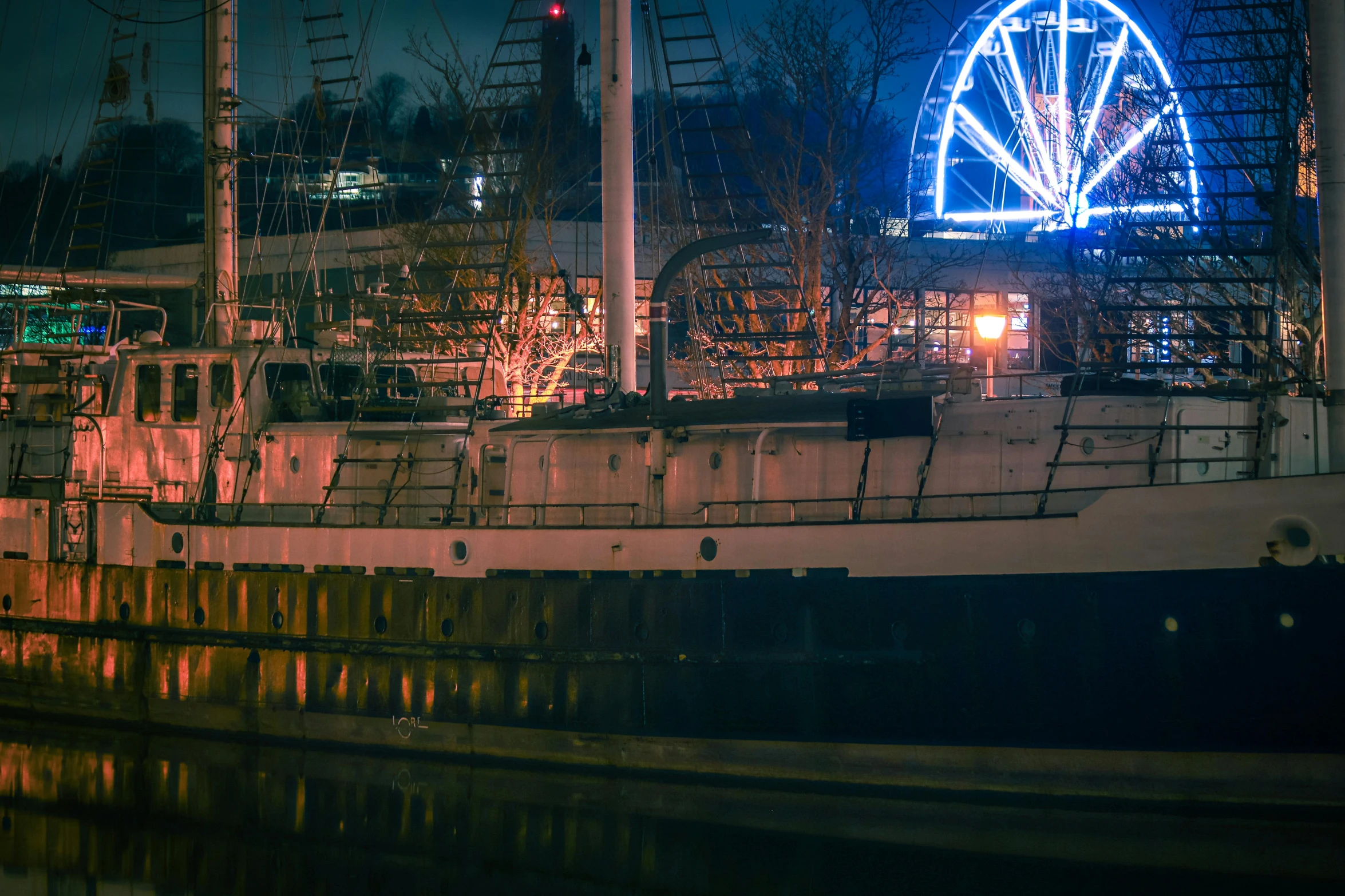 a large boat sitting on top of a body of water, by Dan Frazier, pexels contest winner, graffiti, victorian harbour night, ( ferris wheel ), gigapixel photo, extra detail