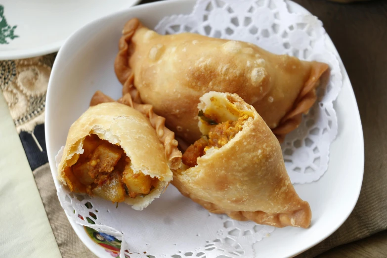 a close up of a plate of food on a table, deep fried, fanoos, fan favorite, profile image