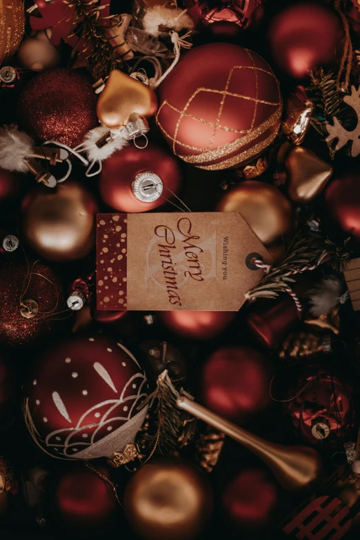 a basket full of red and gold christmas ornaments, pexels contest winner, beautiful labels, dark warm light, thumbnail, flatlay