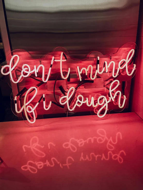 a neon sign that says don't mind if dough, by Julia Pishtar, unsplash contest winner, cosy vibes, 😭 🤮 💕 🎀, reds), breakthrough is iminent