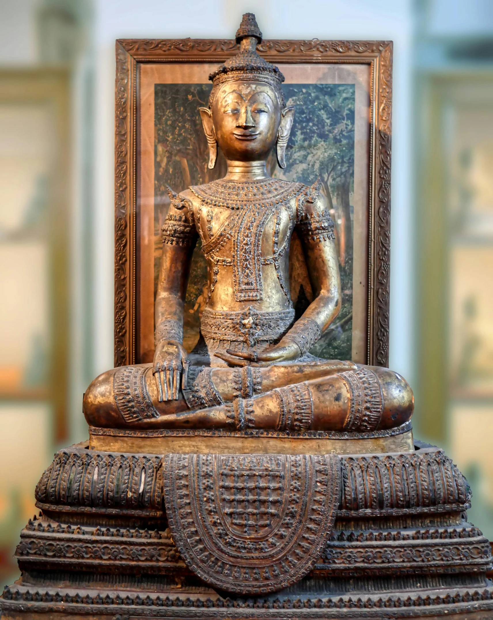 a statue of a person sitting in a lotus position, a bronze sculpture, preserved museum piece, thumbnail, ornately detailed, thawan duchanee