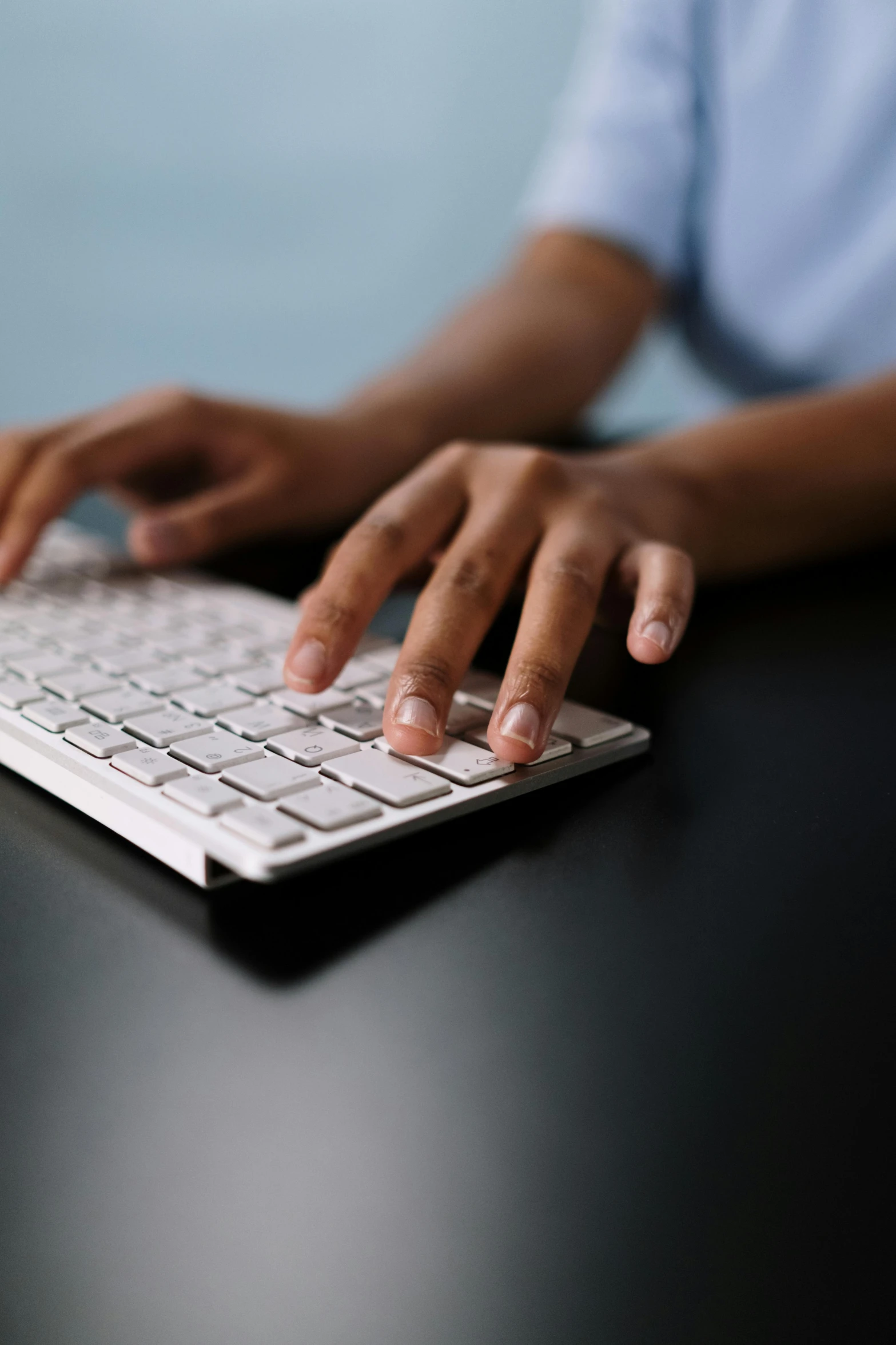 a close up of a person typing on a keyboard, trending on cgtalk, instagram photo, getty images, alexis franklin