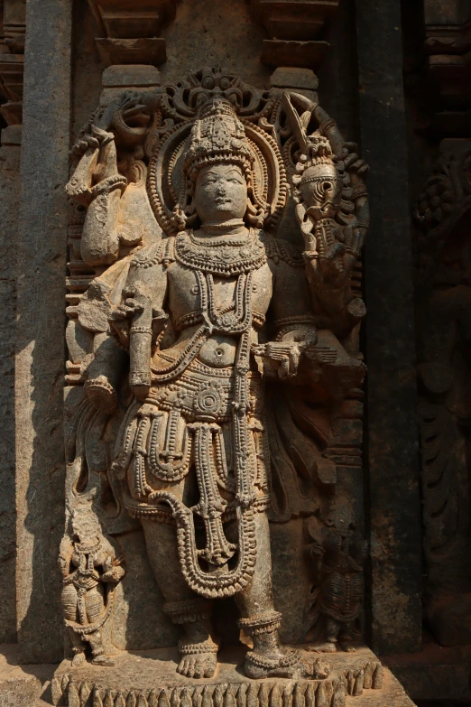 a close up of a statue of a person, a statue, inspired by Thota Vaikuntham, romanesque, figure in center, the empress’ hanging, kailasa temple, the sun