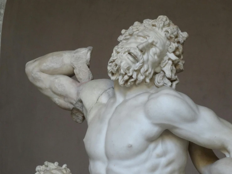 a close up of a statue of a man, a marble sculpture, inspired by Hercules Seghers, pexels contest winner, bursting with muscles, 17th-century, over the shoulder, album