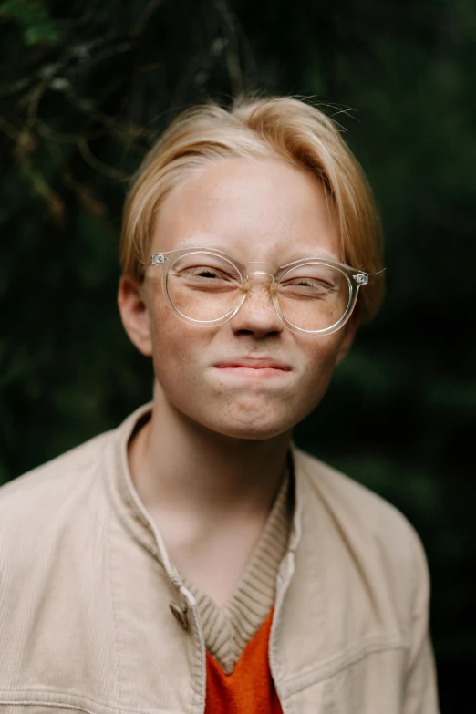 a close up of a person wearing glasses, blond boy, jesper esjing, grimacing, style of jesper ejsing