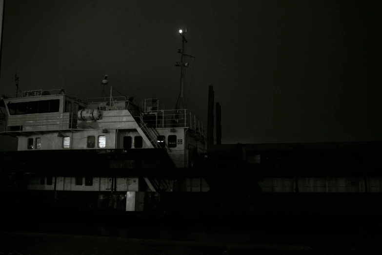 a black and white photo of a boat at night, a black and white photo, unsplash, postminimalism, white moon, dark industrial atmosphere, sepia photography, monochrome:-2