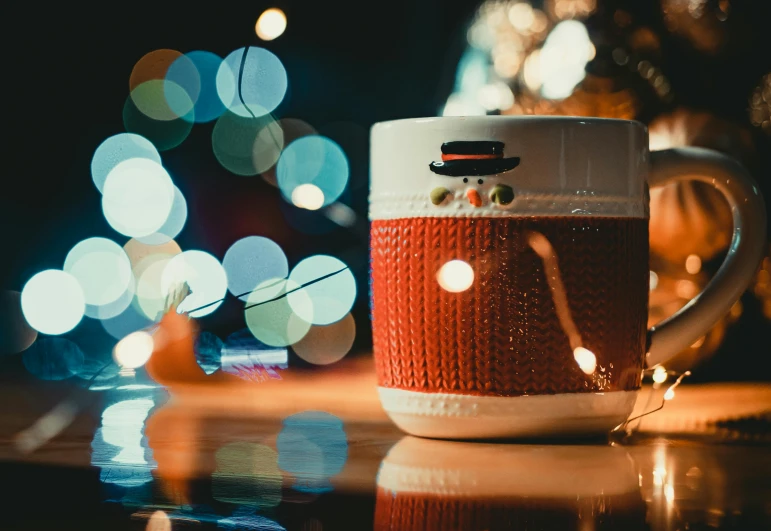 a coffee cup sitting on top of a wooden table, a picture, by Julia Pishtar, pexels contest winner, string lights, toy camera, red and white color theme, hasselblad film bokeh