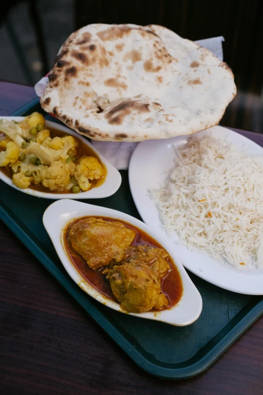 a tray that has some food on it, by Sam Dillemans, unsplash, dau-al-set, indian, head down, square, los angeles ca