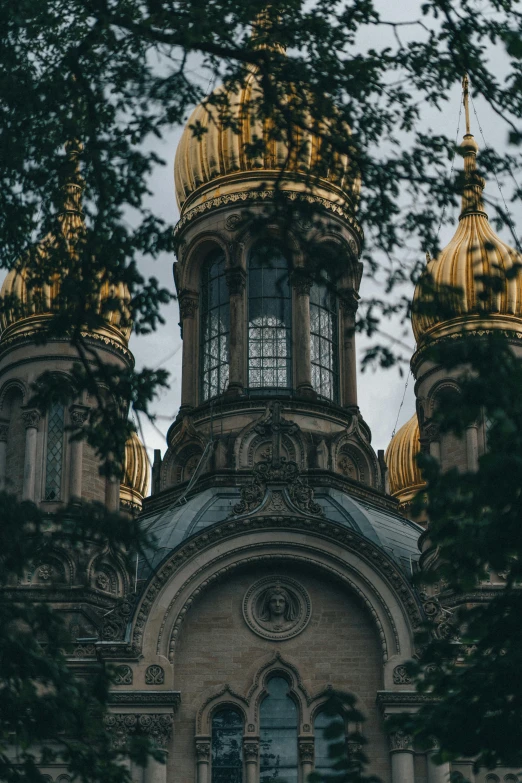 a church with golden domes surrounded by trees, unsplash contest winner, baroque, soviet architecture, dark university aesthetic, curls, peter the great