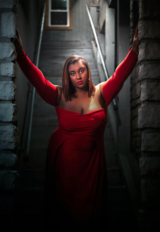 a woman in a red dress posing for a picture, an album cover, by James Warhola, pexels contest winner, renaissance, plus-sized, dramatic intense lighting, square, lgbtq