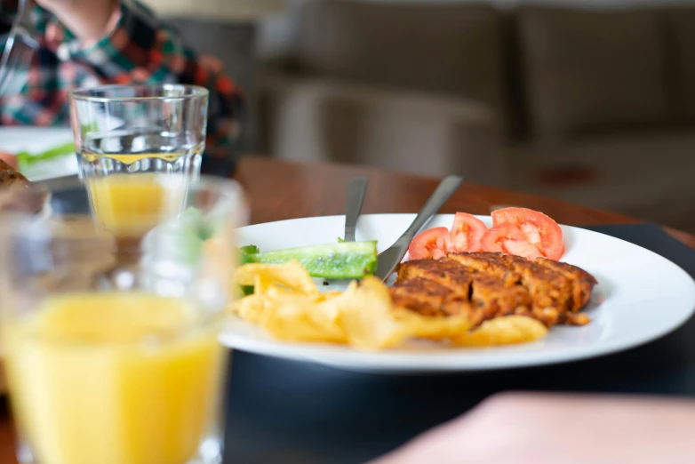 a close up of a plate of food on a table, pexels contest winner, teenage girl, manuka, boys, at home