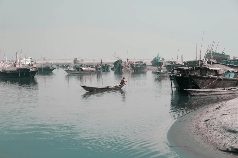 a number of boats in a body of water, by Joseph Severn, pexels contest winner, hurufiyya, assamese aesthetic, thumbnail, muted coloures, high quality image