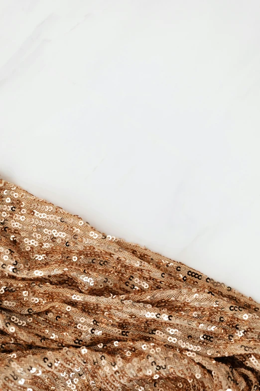 a close up of a dress on a mannequin mannequin mannequin mannequin mannequin mannequin manne, an album cover, trending on pexels, renaissance, scattered golden flakes, in front of white back drop, website banner, rose gold