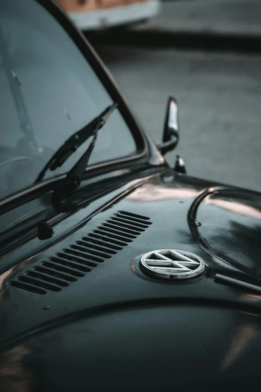 a black vw buggy parked in a parking lot, by Kristian Zahrtmann, pexels contest winner, renaissance, skin detail, vents, soft top, plain background