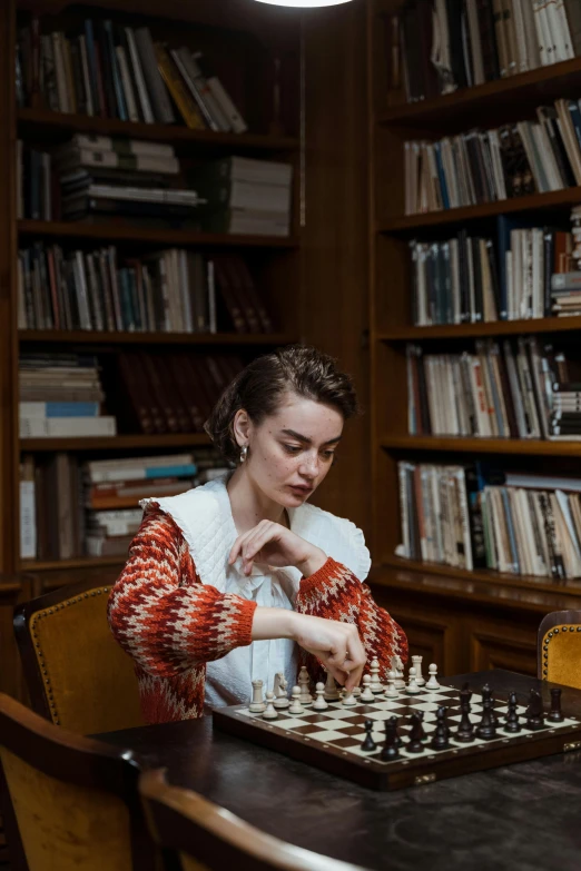 a woman playing a game of chess in a library, a portrait, by Emma Andijewska, unsplash contest winner, lily collins, ignant, france, annoyed