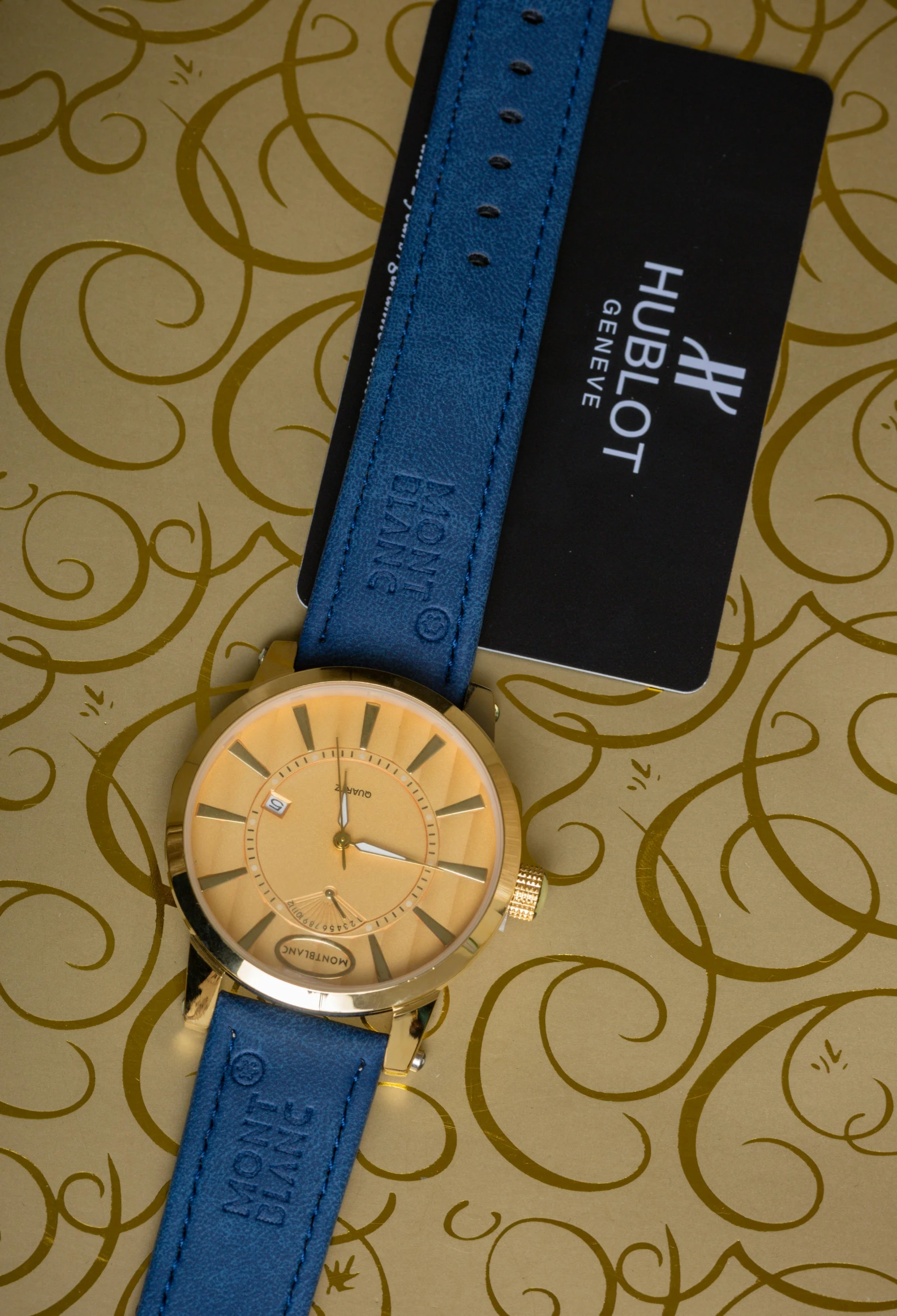 a watch sitting on top of a table next to a credit card, hurufiyya, golden blue outfit, bolero, label, high resolution image