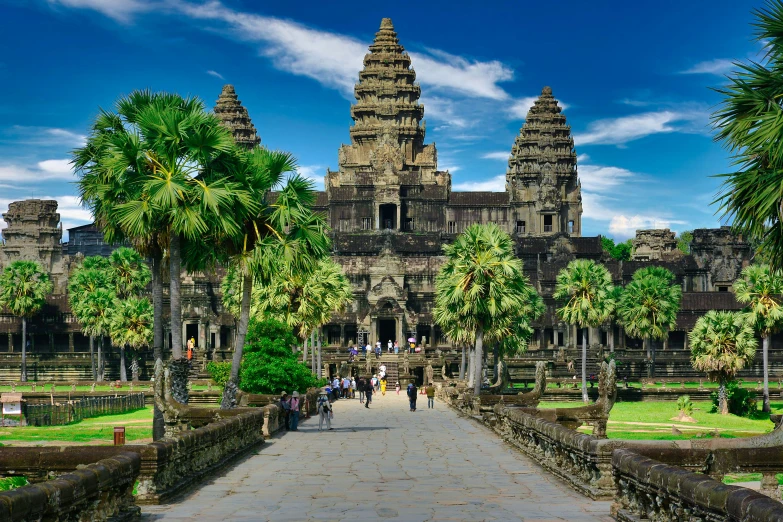 a large stone building surrounded by palm trees, pexels contest winner, angkor thon, avatar image, square, festivals