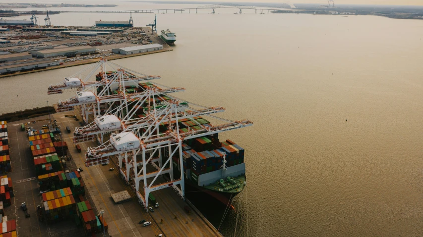 a large container ship sitting on top of a body of water, shipping docks, louisiana, instagram post, high-res