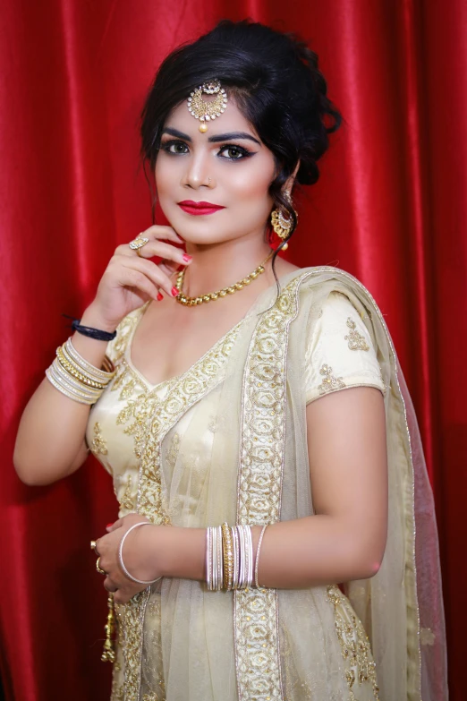 a woman standing in front of a red curtain, inspired by Saurabh Jethani, renaissance, with professional makeup, white!!, golden colour, grayish