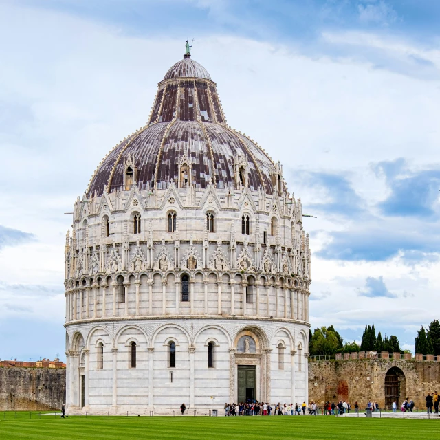 a large white building sitting on top of a lush green field, an album cover, by Giorgio De Vincenzi, pexels contest winner, renaissance, interior of a marble dome, the leaning tower of pizza, bargello, exterior view