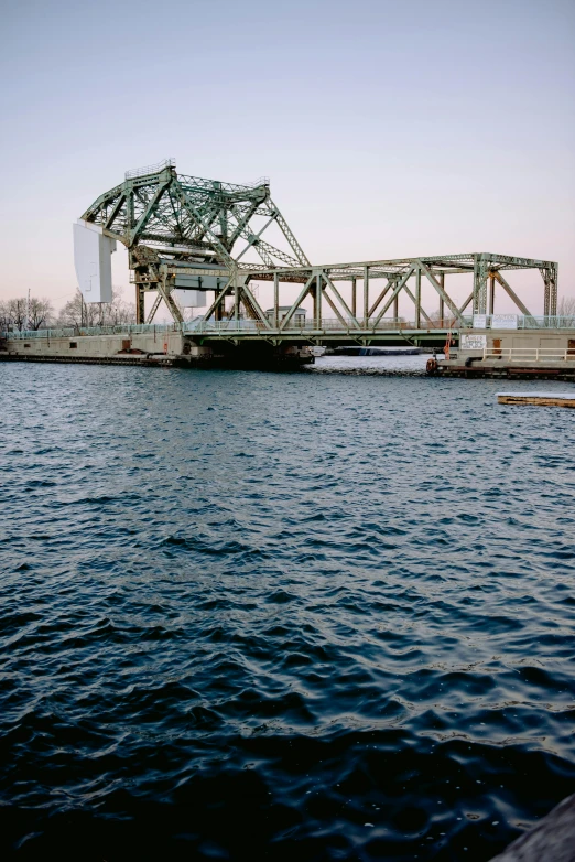 a large bridge over a body of water, by Washington Allston, mechanical structure, taken in the 2000s, dutch tilt, bay