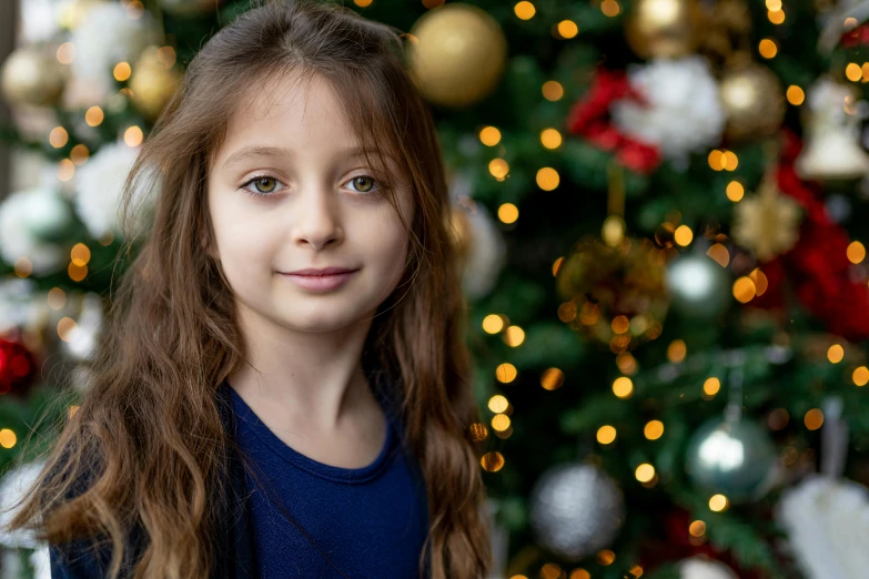 a little girl standing in front of a christmas tree, a portrait, pexels contest winner, hurufiyya, avatar image, girl with brown hair, a beautiful teen-aged girl, lachlan bailey