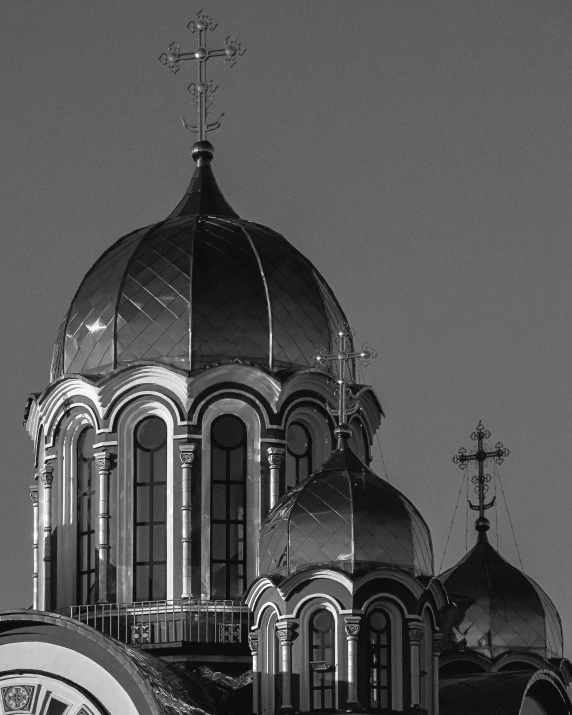 a black and white photo of a clock tower, a black and white photo, by Ihor Podolchak, baroque, domes, evening light, byzantine, neon city domes