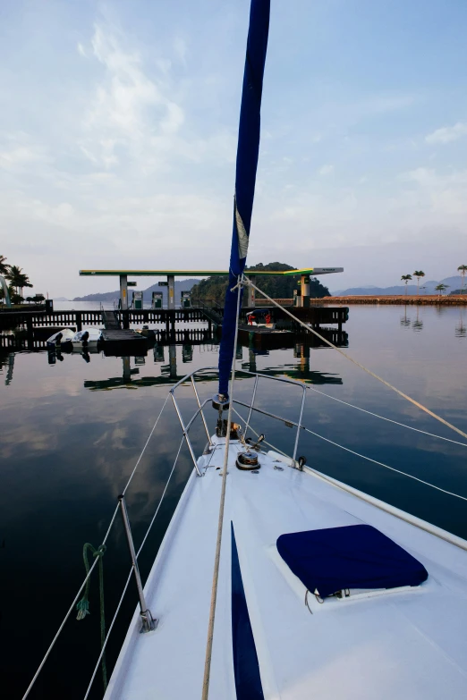 a boat that is sitting in the water, bored ape yacht club, in the early morning, shot on sony a 7, pov photo