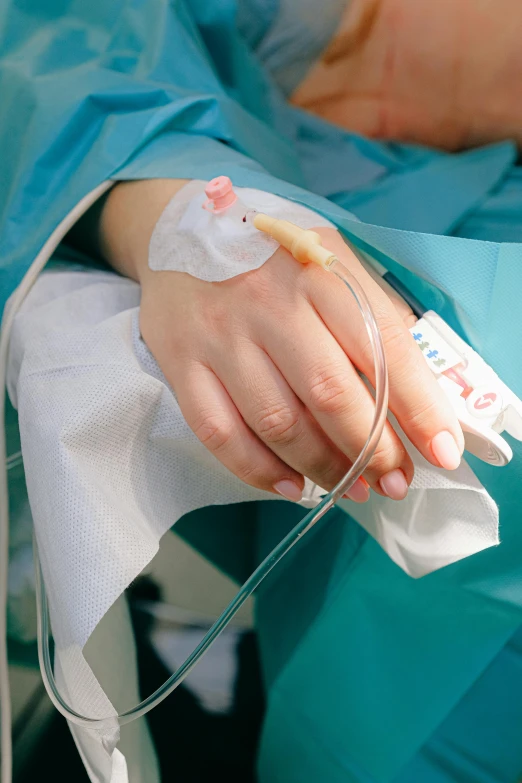 a close up of a person in a hospital bed, surgical iv drip, holding hand, square, innovation