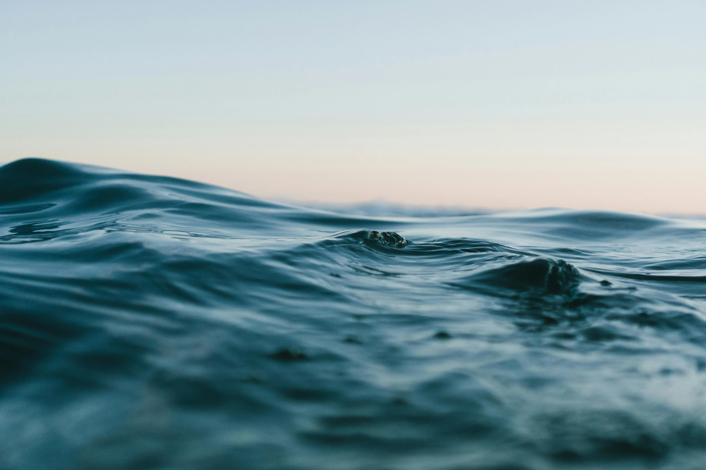 a close up of a body of water, unsplash, happening, ocean dept, early evening, lachlan bailey, ripple