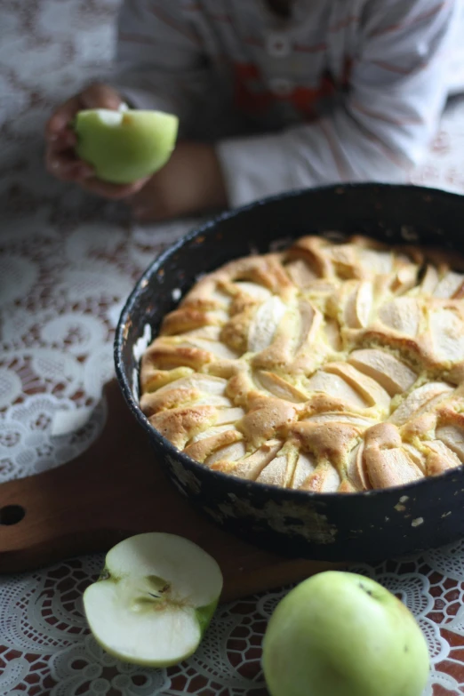 a close up of an apple pie in a pan on a table, a pastel, thumbnail, grain”, kano), holiday