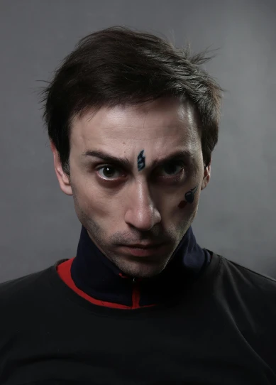 a close up of a person wearing a black shirt, inspired by Nikolai Yaroshenko, trending on reddit, david tennant as spawn, war paint, high quality photo, mass effect inspired
